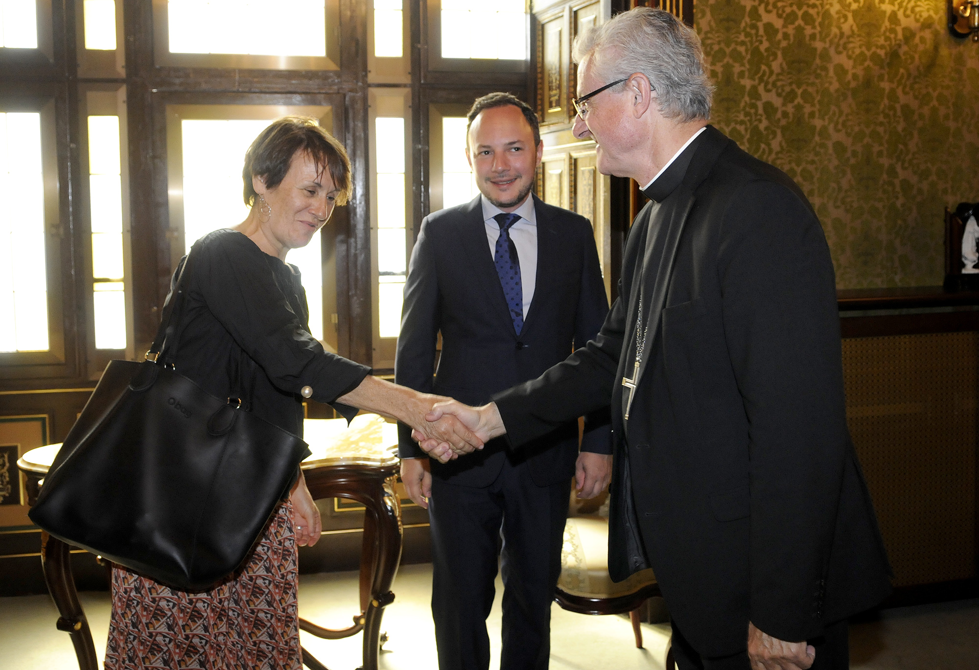 El copríncep Joan-Enric Vives rep a Xavier Espot i Roser Suñé al Palau Episcopal